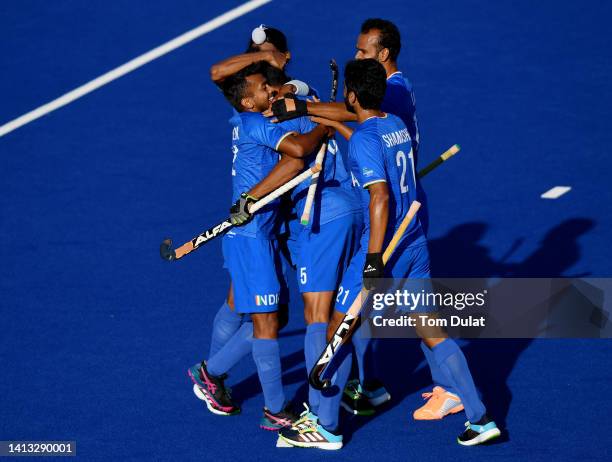 Abhishek of Team India celebrates with team mates after scoring their sides first goal during Men's Hockey - Semi-Final match between India and South...