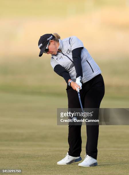 Ashleigh Buhai of South Africa plays her second shot on the 14th hole during the third round of the AIG Women's Open at Muirfield on August 06, 2022...