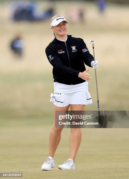 Charley Hull of England plays her second shot on the 14th hole during the third round of the AIG Women's Open at Muirfield on August 06, 2022 in...