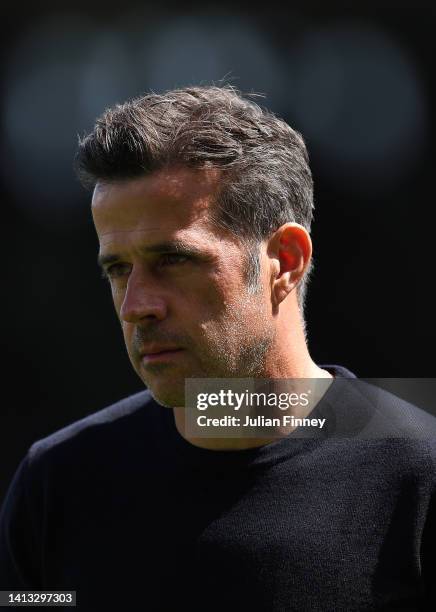 Marco Silva, Head Coach of Fulham, looks on prior to kick off of the Premier League match between Fulham FC and Liverpool FC at Craven Cottage on...
