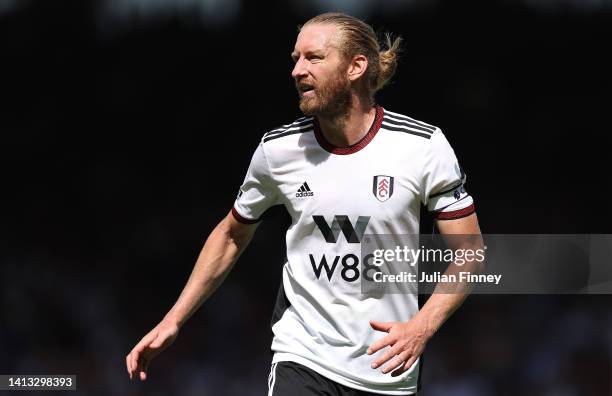 Tim Ream of Fulham looks on during the Premier League match between Fulham FC and Liverpool FC at Craven Cottage on August 06, 2022 in London,...