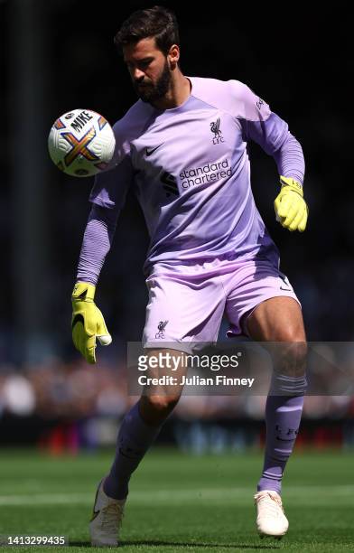 Goalkeeper of Liverpool Alisson Becker during the Premier League match between Fulham FC and Liverpool FC at Craven Cottage on August 06, 2022 in...