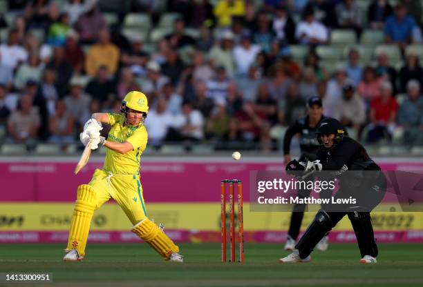 Beth Mooney of Team Australia hits a four during the Cricket T20 - Semi-Final match between Team Australia and Team New Zealand on day nine of the...