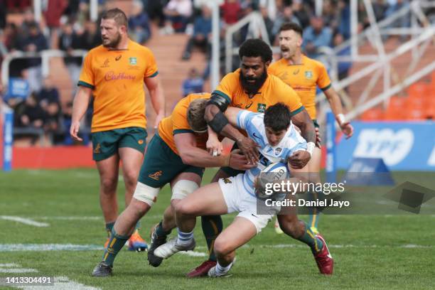 Tomas Cubelli of Argentina is tackled by Marika Koroibete and Matt Philip of Australia during The Rugby Championship match between Argentina Pumas...