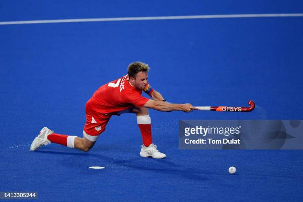 Zachary Wallace of Team England scores their sides penalty during the Men's Hockey - Semi-Final match between Australia and England on day nine of...