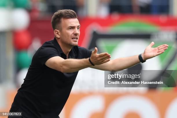 Enrico Maaßen, head coach of Augsburg reacts during the Bundesliga match between FC Augsburg and Sport-Club Freiburg at WWK-Arena on August 06, 2022...