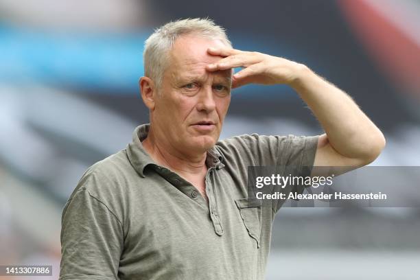 Christian Streich, head coach of Freiburg looks on during the Bundesliga match between FC Augsburg and Sport-Club Freiburg at WWK-Arena on August 06,...