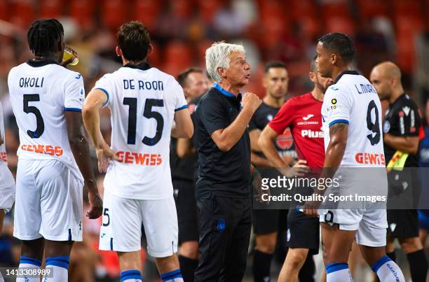 Gian Piero Gasperini, Manager of Atalanta BC talks to his players in the cooling break during the 50th Edition of Trofeu Taronja match between...