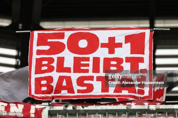 Supporters showing their protest for the 50 + 1 rule during the Bundesliga match between FC Augsburg and Sport-Club Freiburg at WWK-Arena on August...