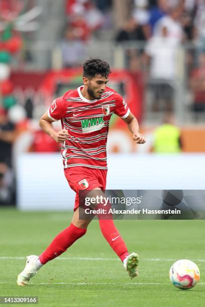 Ricardo Daniel Pepi of Augsburg runs with the ball during the Bundesliga match between FC Augsburg and Sport-Club Freiburg at WWK-Arena on August 06,...