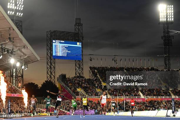 Jereem Richards of Team Trinidad and Tobago celebrates as they cross the finish line to win the gold medal in the Men's 200m Final on day nine of the...