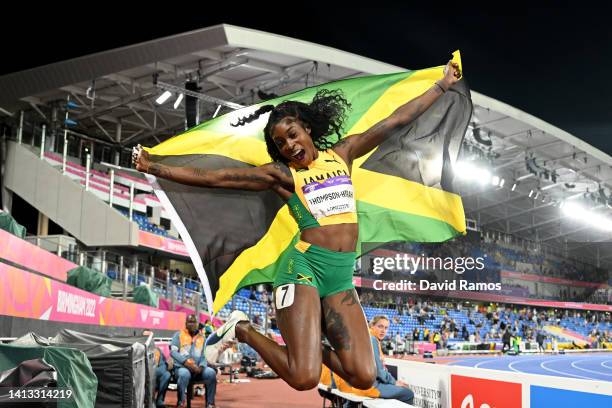 Elaine Thompson-Herah of Team Jamaica celebrates winning the gold medal in the Women's 200m Final on day nine of the Birmingham 2022 Commonwealth...