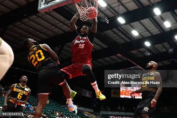 Amir Johnson of the Trilogy dunks against Donte Green of the Killer 3's during BIG3 Week Eight at Comerica Center on August 06, 2022 in Frisco, Texas.