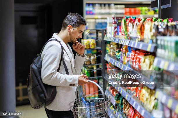 not sure which type of coffee to buy - convenience food stock pictures, royalty-free photos & images