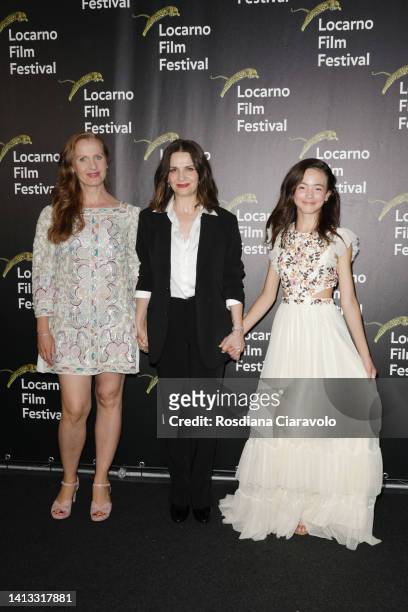 Director Anna Gutto, Juliette Binoche and Hala Finley attend the 75th Locarno Film Festival red carpet on August 06, 2022 in Locarno, Switzerland.