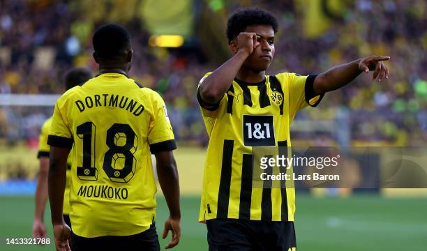Karim Adeyemi of Dortmund celebrates after scoring his teams first goal during the Bundesliga match between Borussia Dortmund and Bayer 04 Leverkusen...