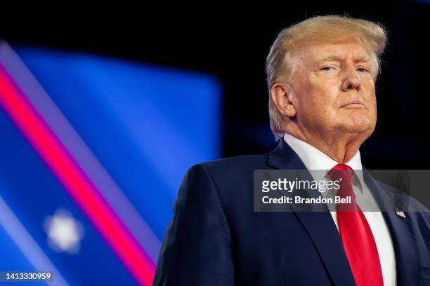 Former U.S. President Donald Trump prepares to speak at the Conservative Political Action Conference CPAC held at the Hilton Anatole on August 06,...