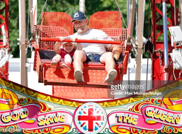 Lena Tindall and Mike Tindall ride on a Ferris wheel as they attend day 2 of the 2022 Festival of British Eventing at Gatcombe Park on August 6, 2022...