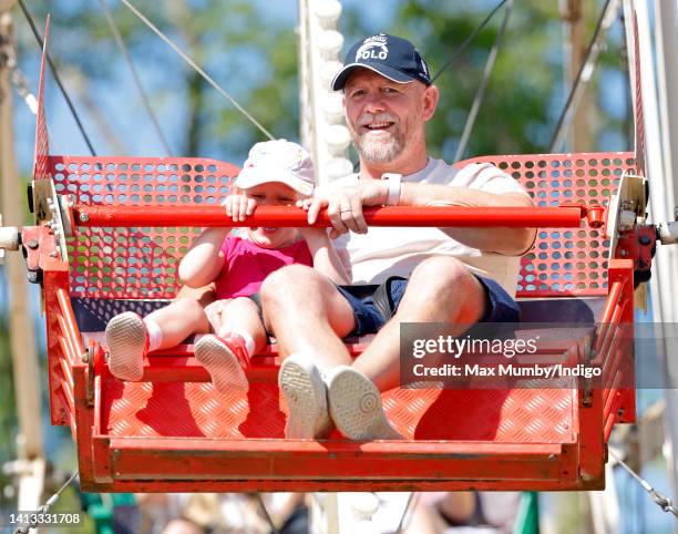 Lena Tindall and Mike Tindall ride on a Ferris wheel as they attend day 2 of the 2022 Festival of British Eventing at Gatcombe Park on August 6, 2022...