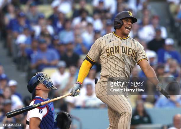 Juan Soto of the San Diego Padres reacts to his foul in front of Austin Barnes of the Los Angeles Dodgers during the first inning at Dodger Stadium...