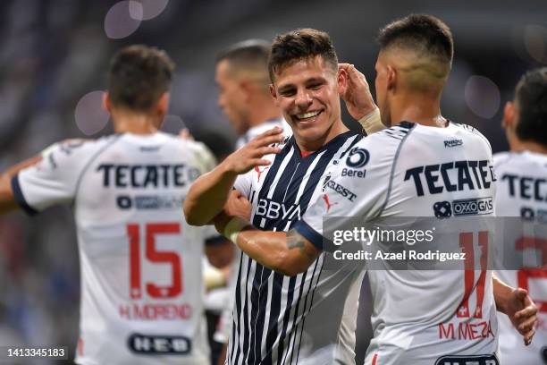 Arturo González of Monterrey celebrates with teammates after scoring his team’s fourth goal during the 7th round match between Monterrey and Leon as...