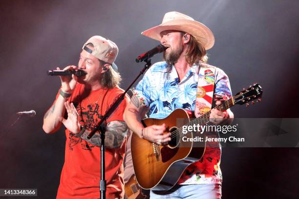 Tyler Hubbard and Brian Kelley of Florida Georgia Line perform during day 3 of the 2022 Boots And Hearts Music Festival at Burl's Creek Event Grounds...