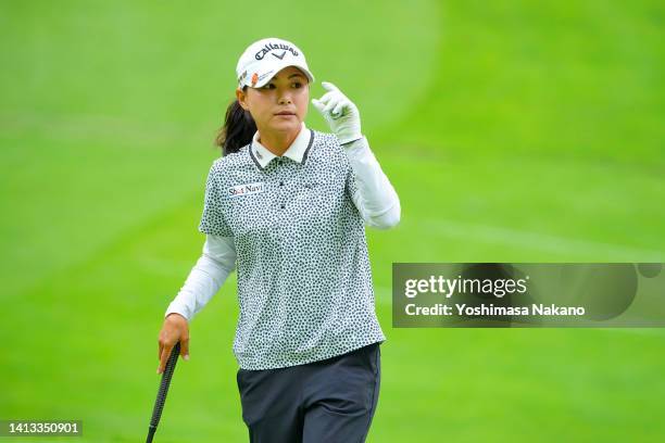 Sakura Yokomine of Japan acknowledges the gallery on the 5th green during the final round of Hokkaido meiji Cup at Sapporo International Country Club...
