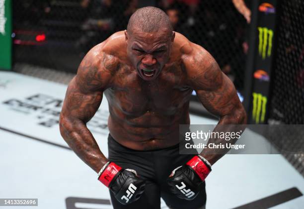 Mohammed Usman of Nigeria reacts after his knockout victory over Zac Pauga in a heavyweight fight during the UFC Fight Night event at UFC APEX on...