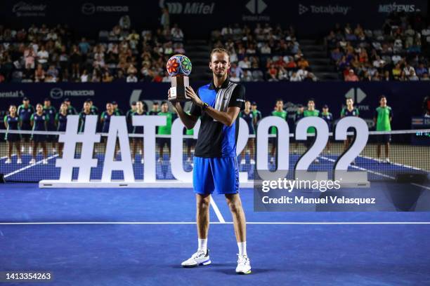 Daniil Medvedev of Russia celebrates with the trophy after winning the match against Cameron Norrie of Great Britain after the Mifel ATP Los Cabos...