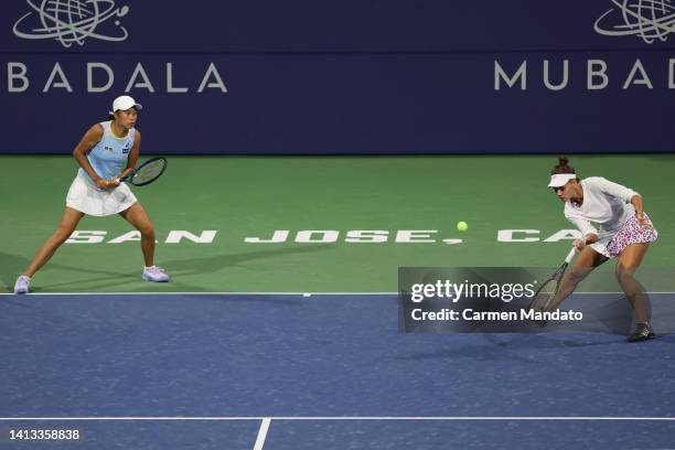 Veronika Kudermetova of Russia and Zhang Shuai of China play a shot during the Semi- Final doubles match against Yang Zhaoxuan of China and Xu Yifan...