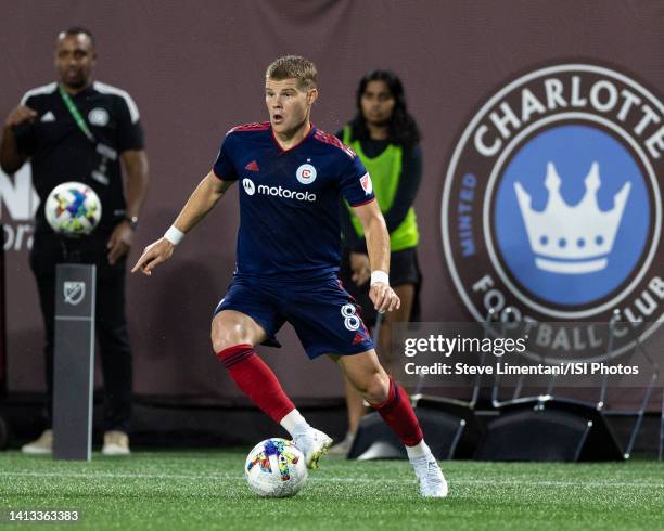 Chris Mueller of Chicago Fire makes a move during a game between Chicago Fire FC and Charlotte FC at Bank of America Stadium on August 6, 2022 in...