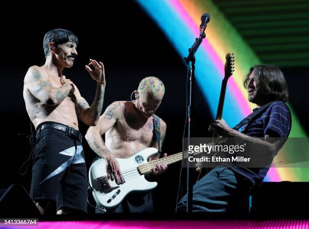 Singer Anthony Kiedis, bassist Flea and guitarist John Frusciante of Red Hot Chili Peppers perform at Allegiant Stadium on August 06, 2022 in Las...
