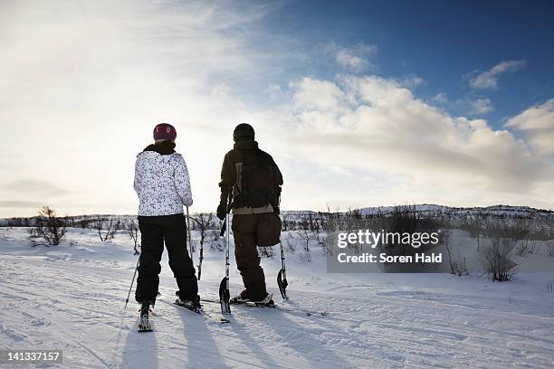one-legged skier with girlfriend - geilo stock pictures, royalty-free photos & images