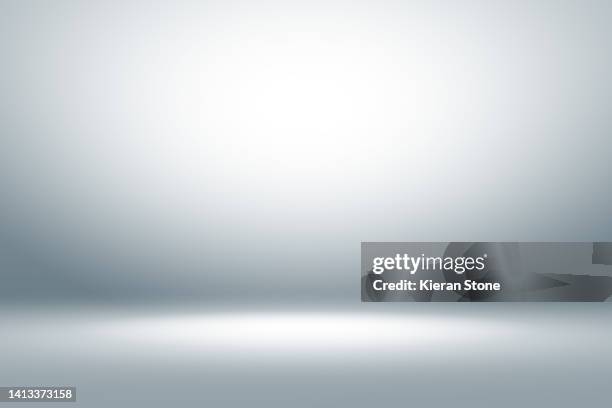 clean studio backdrop - illuminated photos stock pictures, royalty-free photos & images