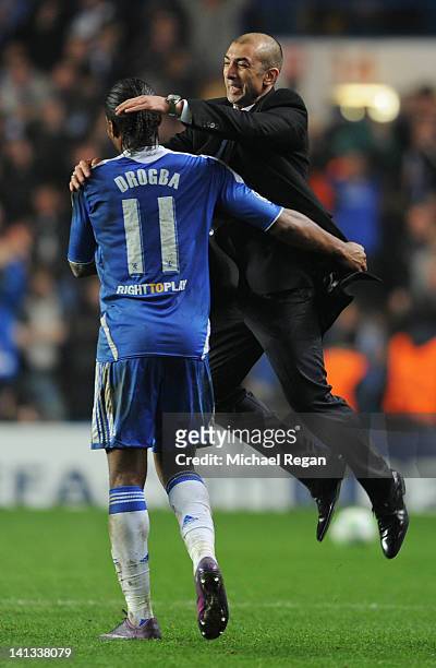 Roberto Di Matteo caretaker manager of Chelsea celebrates victory with Didier Drogba after the UEFA Champions League Round of 16 second leg match...