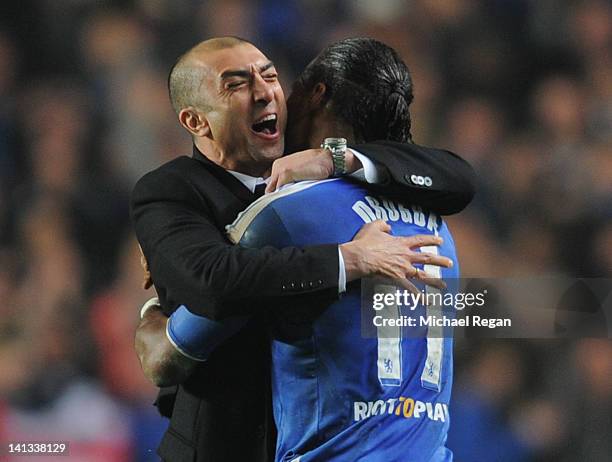 Roberto Di Matteo caretaker manager of Chelsea celebrates victory with Didier Drogba after the UEFA Champions League Round of 16 second leg match...