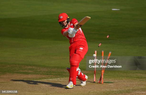 Natalie Sciver of Team England is bowled by Sophie Devine of Team New Zealand during the Cricket T20 - Bronze Medal match between Team England and...