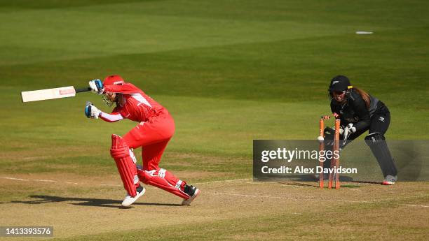 Sophia Dunkley of Team England is bowled by Amelia Kerr of Team New Zealand during the Cricket T20 - Bronze Medal match between Team England and Team...