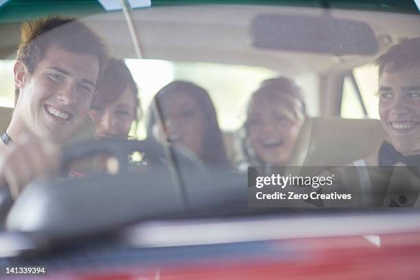 teenagers driving in formal wear - formal party stock pictures, royalty-free photos & images