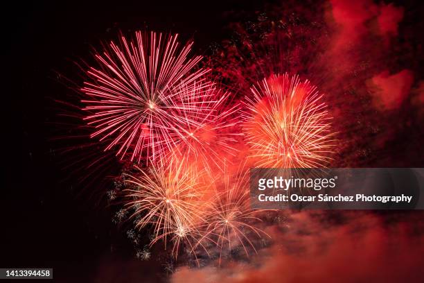 waterfront fireworks - firework stock-fotos und bilder