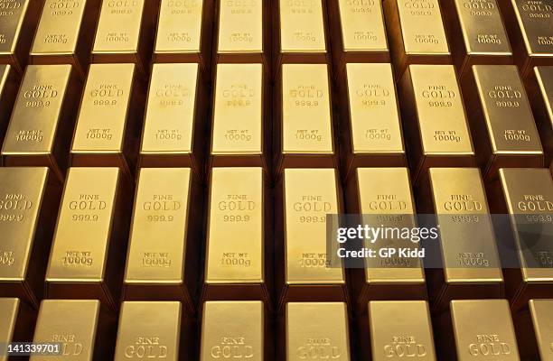 close up of gold bars - bullion stockfoto's en -beelden