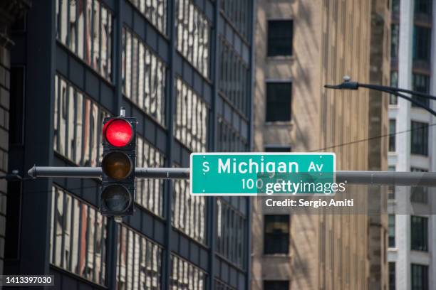 south michigan avenue overhead sign - street name sign stock pictures, royalty-free photos & images