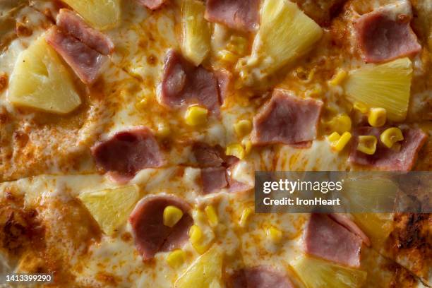 close up hawaiian pizza for background. - hawaiian pizza stock pictures, royalty-free photos & images