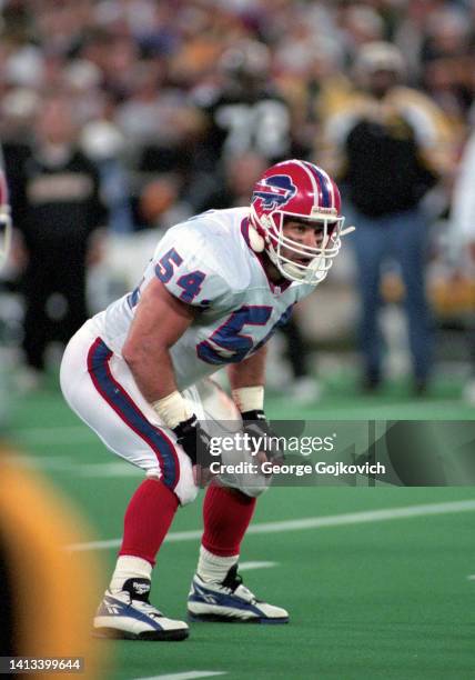 Linebacker Chris Spielman of the Buffalo Bills looks on from the field during a Monday Night Football game against the Pittsburgh Steelers at Three...