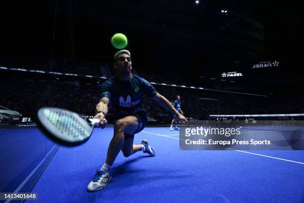 Martin Di Nenno of Argentina in action during the doubles match with Francisco Navarro of Spain against Juan Lebron and Alejandro Galan of Spain...