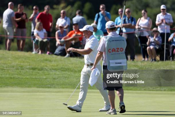 Paul Dunne of Ireland interacts with the crowd on the 3rd hole during day four of the Cazoo Open at Celtic Manor Resort on August 07, 2022 in...