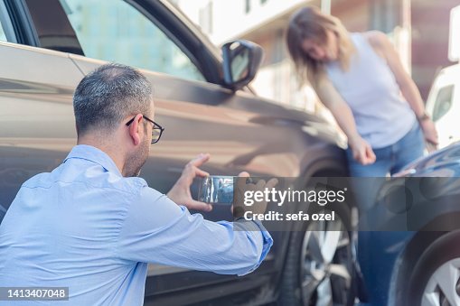 Photographing Car After A Traffic Accident Photographing Car After A Traffic Accident