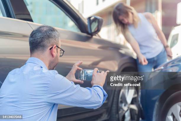 photographing car after a traffic accident - car accident stock pictures, royalty-free photos & images