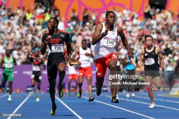 Ojie Edoburun of Team England crosses the finish line to win the gold medal in the Men's 4 x 100m Relay - Final on day ten of the Birmingham 2022...