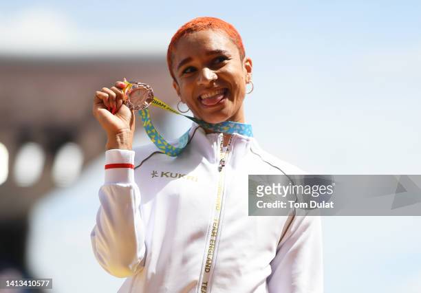 Bronze medalist Jodie Williams of Team England poses for a photo during the medal ceremony for the Women's 400m Final on day ten of the Birmingham...